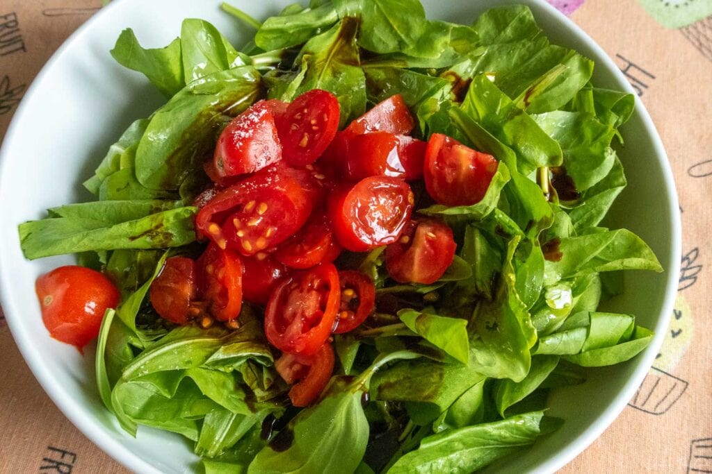 radicchio verde is one of the typical local food to be eaten with cherry tomatoes